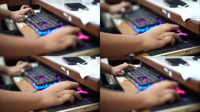 亚洲男孩使用键盘工作