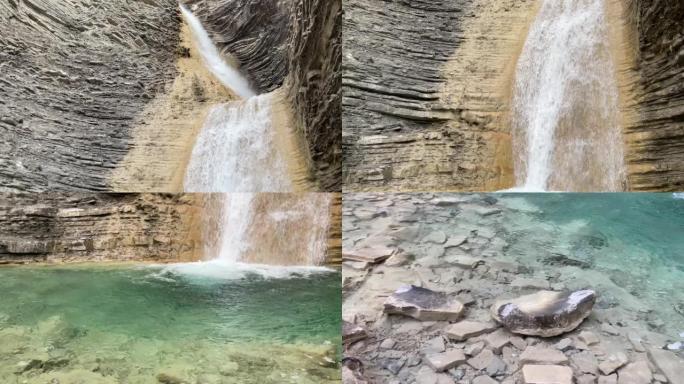 水晶水在石墙上的瀑布，层层叠叠，阿拉贡比利牛斯山脉的Cascada de Oros，瓦莱德尔特纳，韦