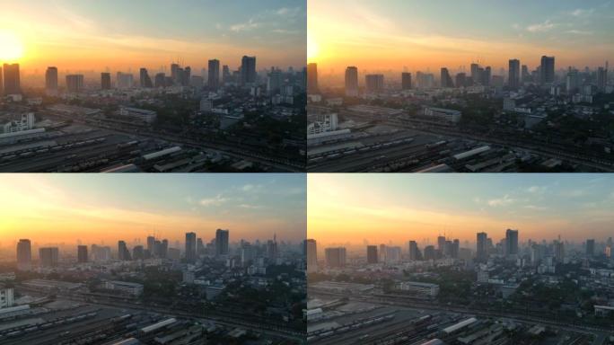 空中无人机日出场景曼谷天际线，商业城市，曼谷市中心的景色，飞越泰国曼谷。