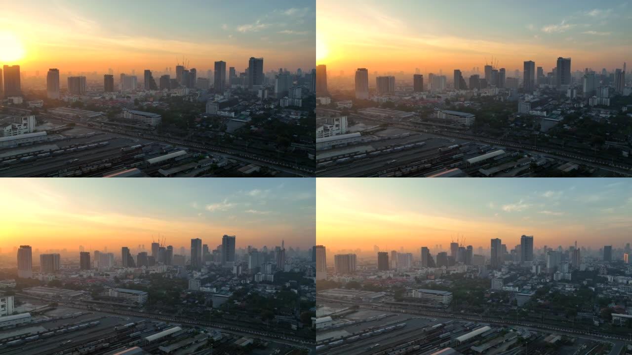 空中无人机日出场景曼谷天际线，商业城市，曼谷市中心的景色，飞越泰国曼谷。