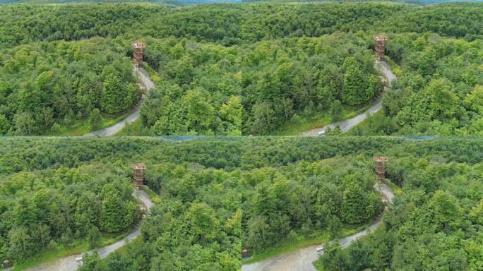 鸟瞰图缓慢下降，无人机显示了Outaouais Montagnes Noires公园的watch望塔