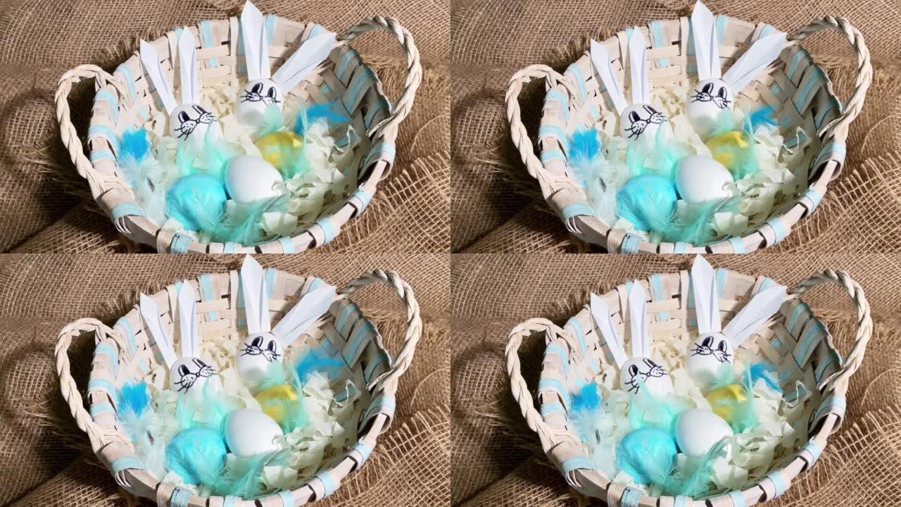 自制复活节兔子兔子，由粗麻布背景篮子中的白鸡蛋制成。复活节快乐概念