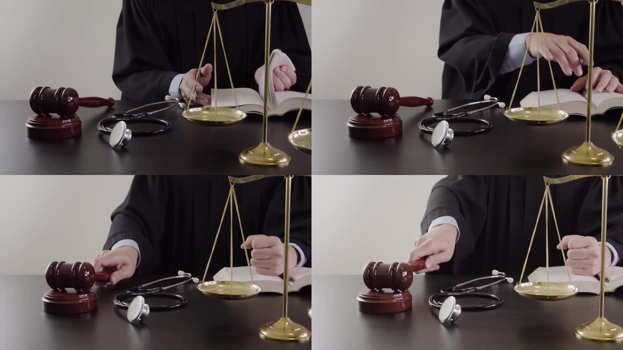 正义与法律观念。法官在法庭上工作的慢动作，在深色的木桌上用小木槌和黄铜天平做出裁决