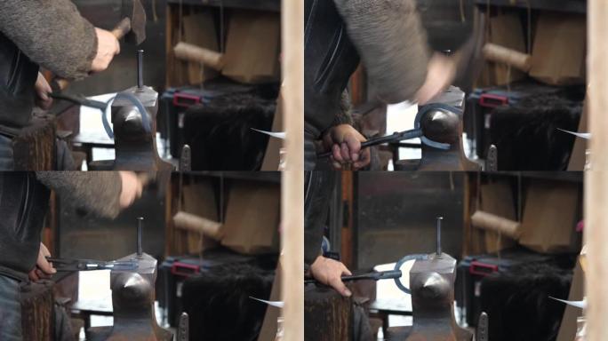 匿名史密斯，铁匠锻造马蹄铁锤，用锤子在铁砧上击打铁水，双手特写，细节。旧工作，稀有职业，传统锻造细节