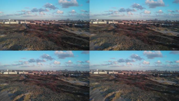 从Zuiderstrand的沙丘上看到的海牙航拍镜头，背景为Duindorp和天际线