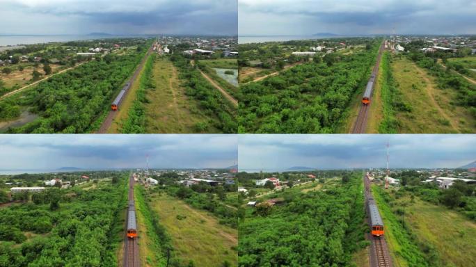 泰国中部Pa Sak dam Lopburi上的火车和大坝大桥的铁路桥的空中无人机视图。