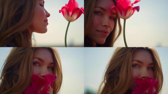 特写美女脸在柔和的夕阳户外享受郁金香花。