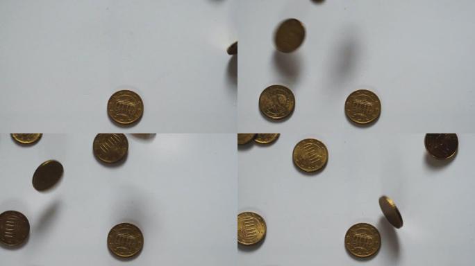 欧元硬币落在地上-慢动作