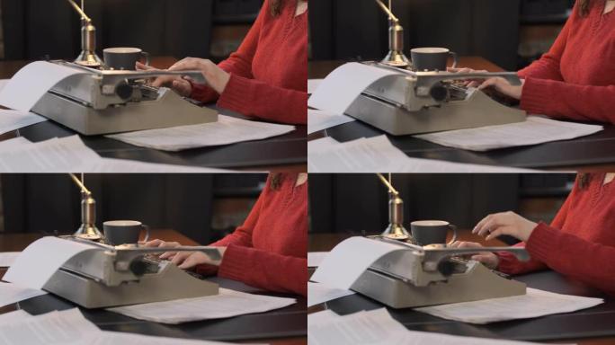 女作家使用打字机的特写