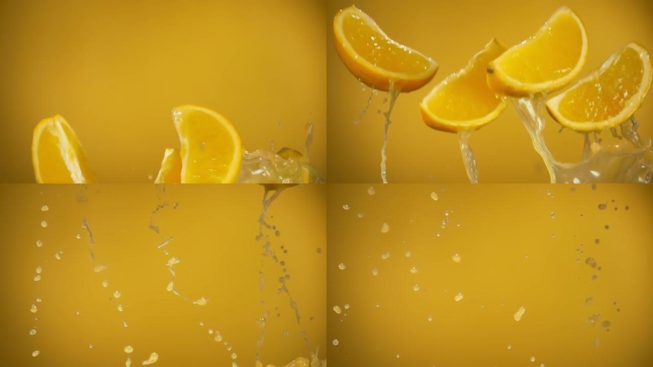 新鲜橙子的特写镜头随着橙汁的飞溅而弹跳