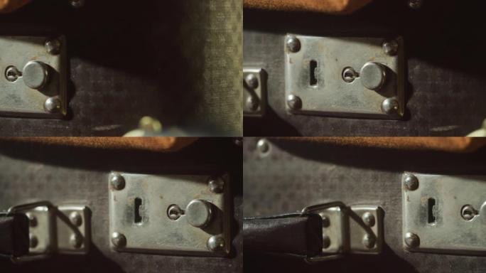 老式手提箱特写。金属袋锁和手柄，细节概念。旅行和旅游。