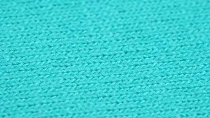 纺织背景-蓝色棉涤纶织物。微距拍摄