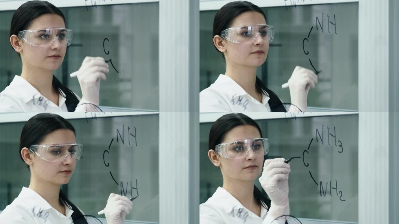 实验室里的女人在玻璃板上写公式