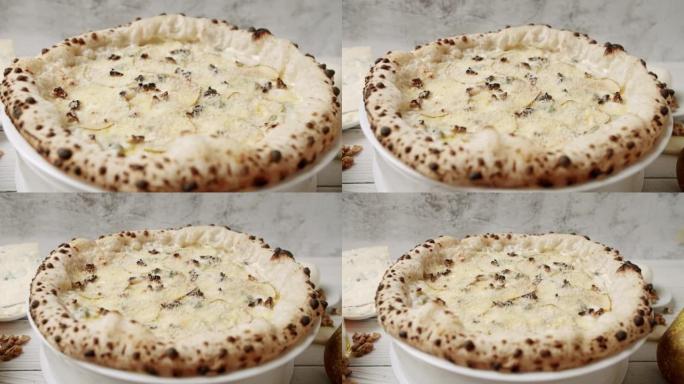 大披萨，带4个奶酪和梨，准备吃美味的意大利披萨。
