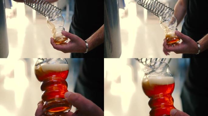 酿酒商检查水箱里的啤酒。在工厂品尝啤酒。