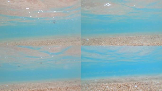 海浪冲刷热带岛屿海岸的水下视图