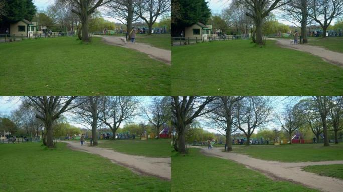 伦敦东肯特郡Swonly早春天然公园的全景拍摄。哈皮一家人在公园散步。Narure，旅行概念。