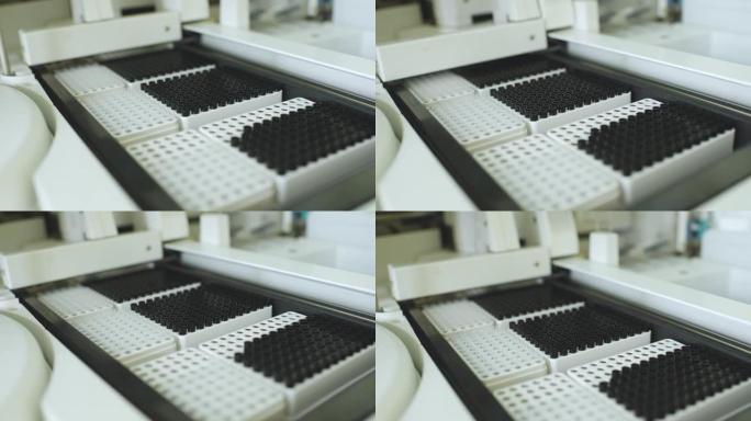PCR实验室中带有试管的容器的分析仪