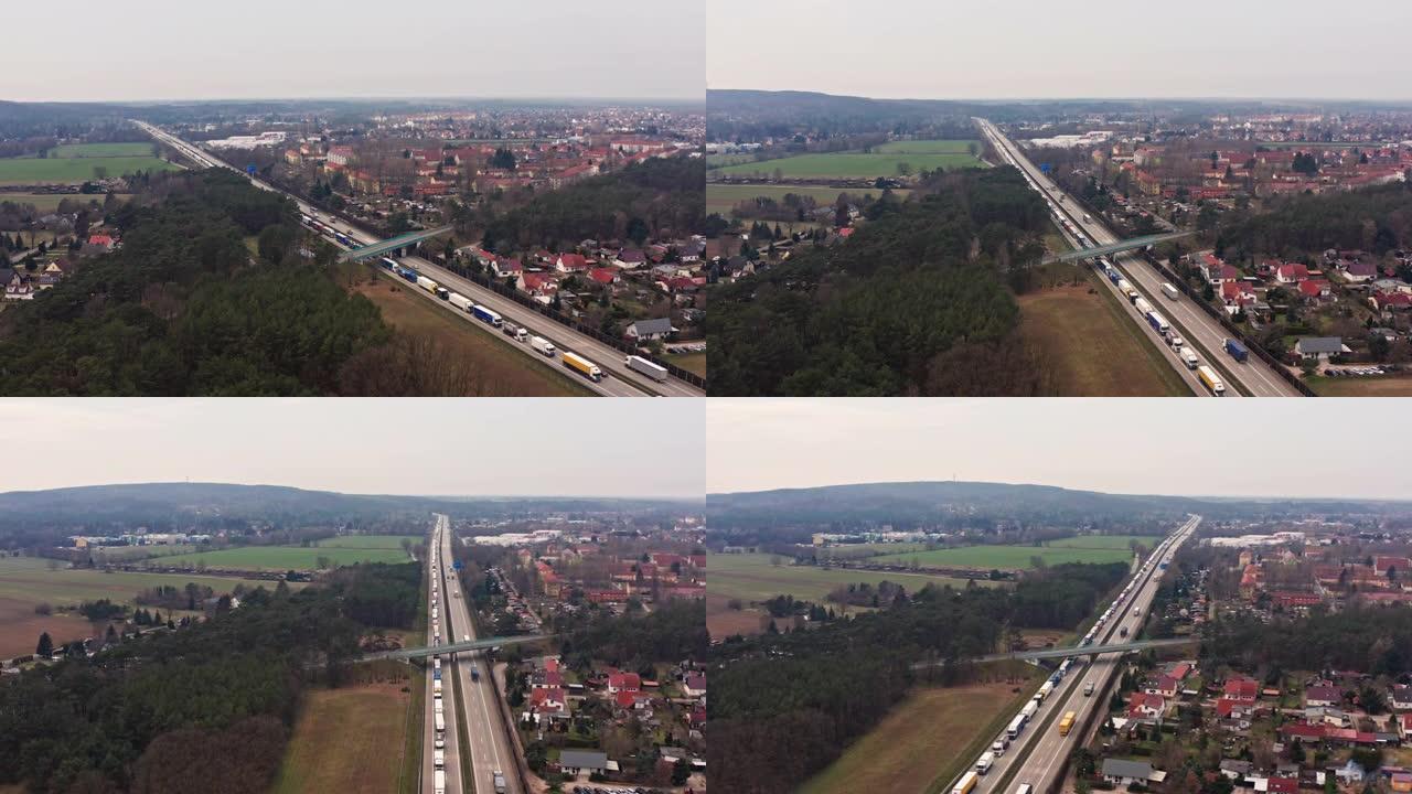 一辆卡车在德国高速公路上堵车的鸟瞰图。