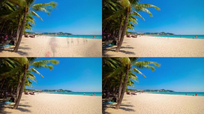 阳光灿烂的三亚著名的大东海海滩全景4k延时中国海南岛