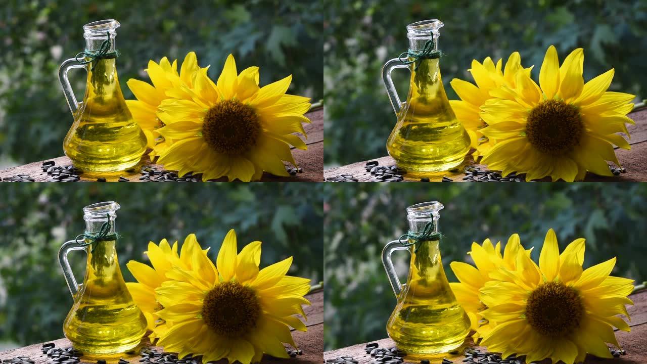 玻璃盘中的葵花籽油。用于制造油的葵花花和种子
