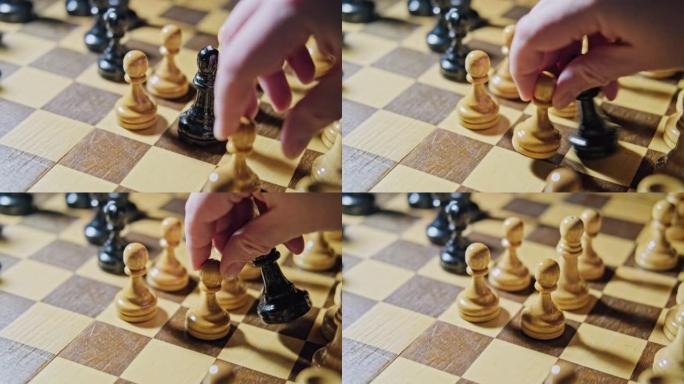 白卒在下棋中被白卒俘获主教。在棋盘游戏中手拿棋子的人