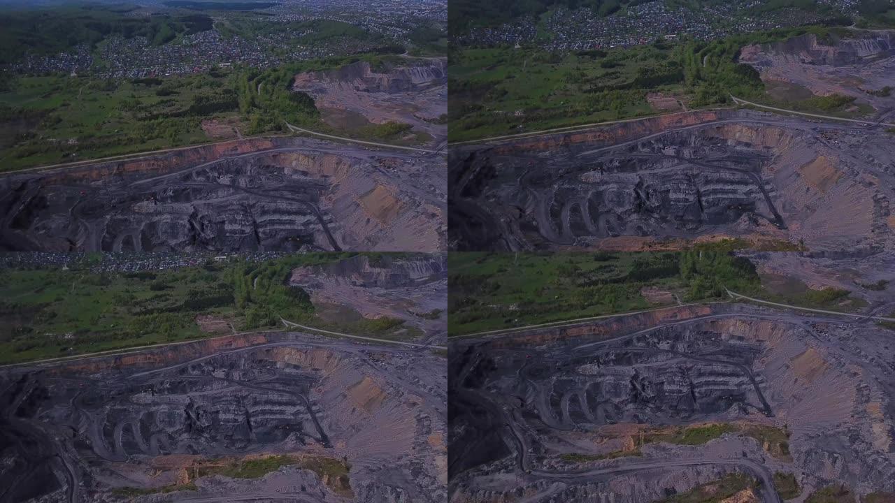 采煤区、露天矿、采石的鸟瞰图。无人机飞越露天煤矿开采，总体方案。