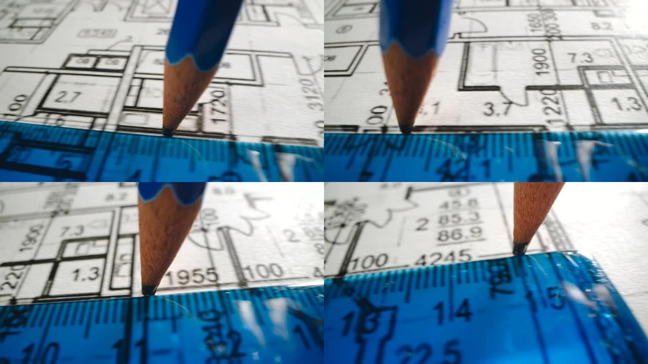 用尺子在白纸上画一条线的铅笔