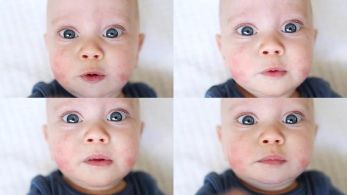 蓝眼睛婴儿试图进入相机的极端特写肖像
