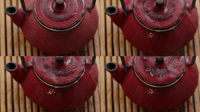 红色的中国茶壶是用开水倒的。茶道