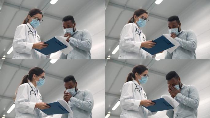 女医生显示测试结果，使戴着安全口罩的非裔美国男性患者不安