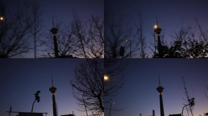 在伊朗德黑兰暮光之城的米拉德塔的视频中开车