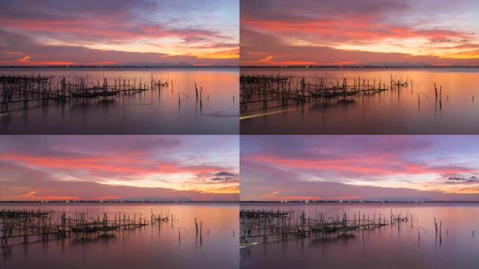 泰国宋卡府宋卡湖渔场和移动天空的延时日落场景