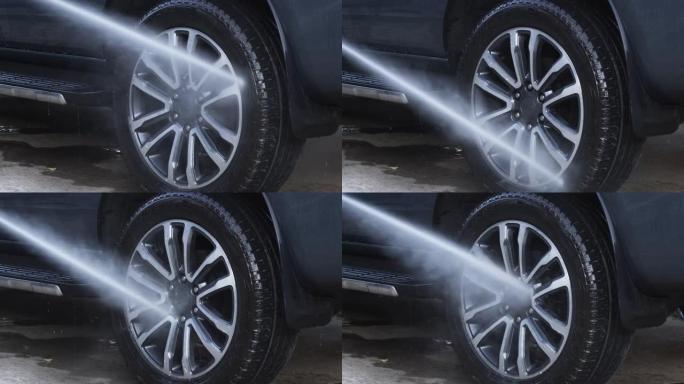 水雾喷洒到汽车车轮上清洗后。