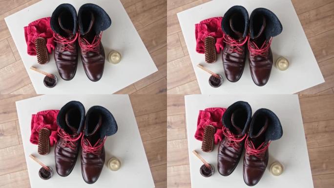 清洁棕色闪亮冬季皮靴鞋蜡和抛光使用鞋防水霜和马毛刷