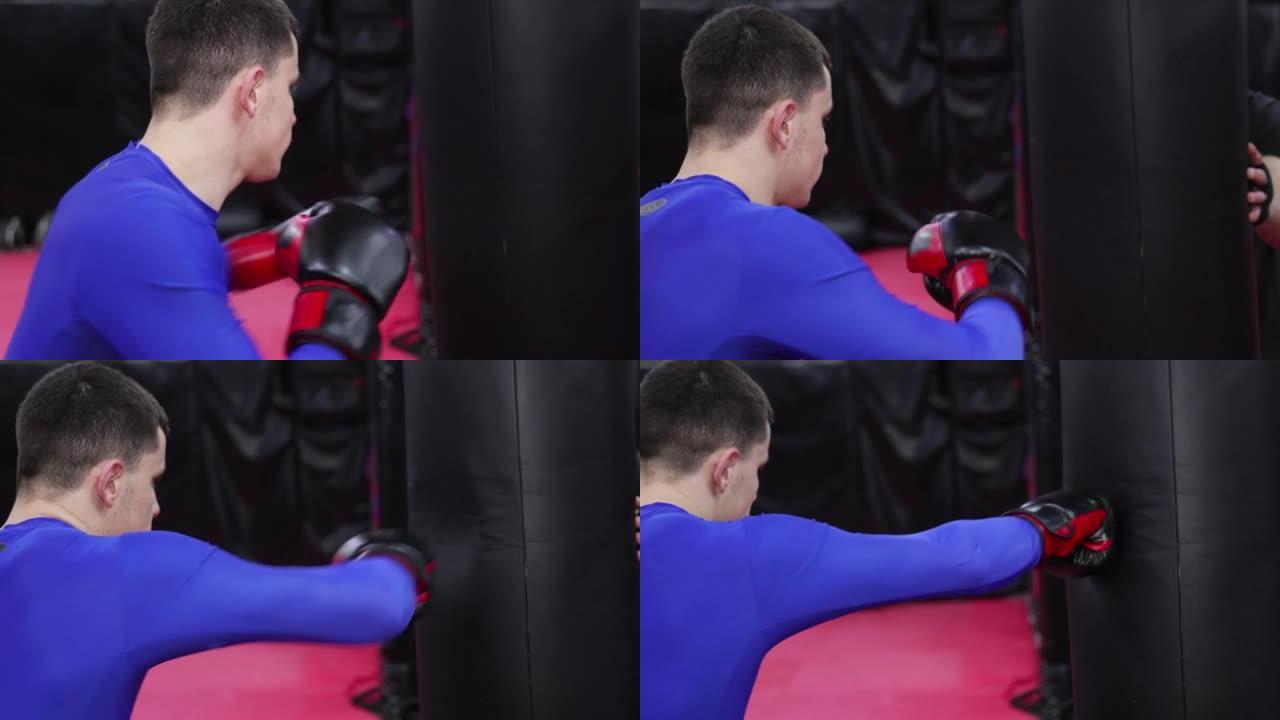 强健少年在拳击馆训练，慢动作