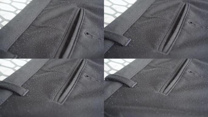 黑色针织男裤，带卷轴颗粒。