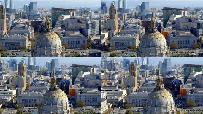 从空中近距离拍摄旧金山市中心的市政厅，华丽的圆顶被万豪珠宝盒酒店的销售大楼所包围