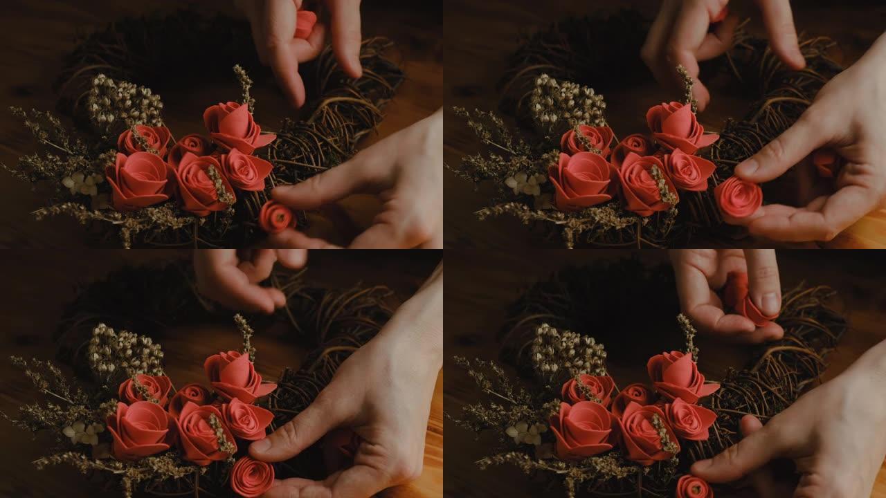 女性手制作DIY花卉花环