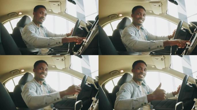 一个人测试一辆新车。专注的非洲男子坐在驾驶座上，使用仪表板进行导航的侧视图。男子按下汽车多媒体面板上