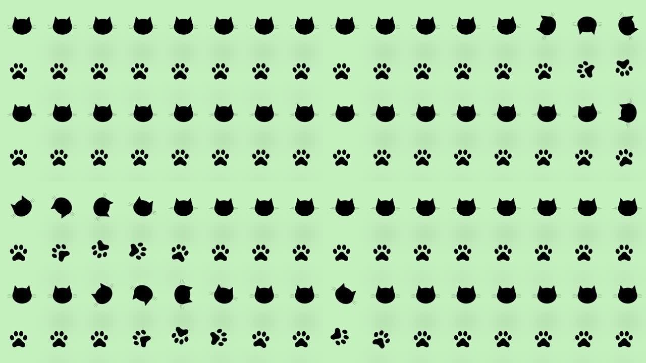 绿色背景上黑猫头和爪子的彩色图案。猫爪和脸无缝图案。动物轮廓。4k视频运动
