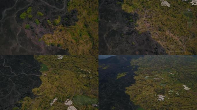 黑色熔岩地形和火山土壤巴图尔无人机镜头的俯视图
