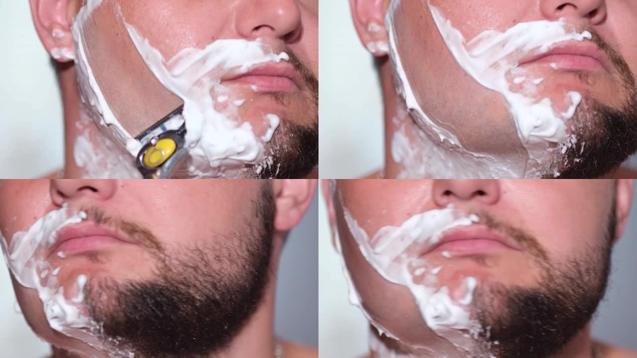 年轻人脸上有安全剃刀和剃须膏。