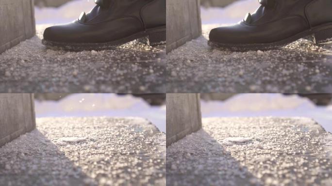 特写行人的脚踩在台阶上的防滑试剂冬日晴天，慢摩