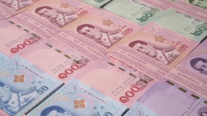 特写多莉拍摄泰国不同叠的钞票，泰国