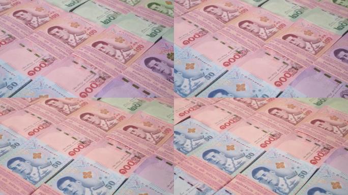 特写多莉拍摄泰国不同叠的钞票，泰国