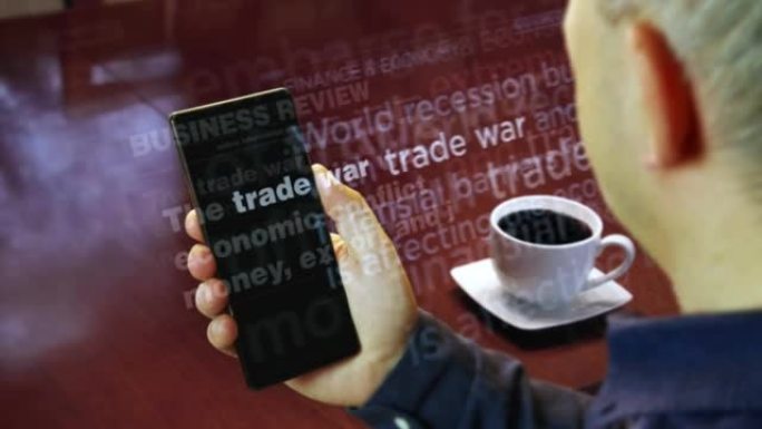 屏幕上的新闻标题与贸易战进出口税有关