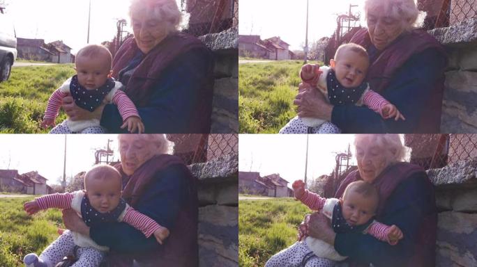 祖母手中的快乐宝贝肖像，特写。