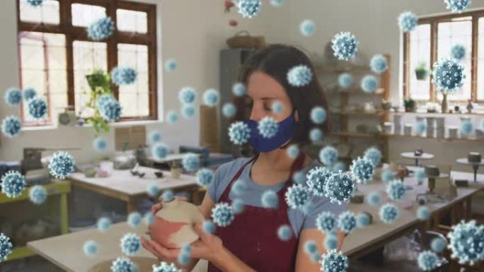 新型冠状病毒肺炎细胞漂浮在戴着口罩的女性波特身上的复合视频