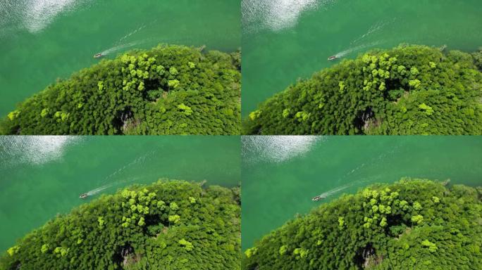 空中无人机在渔民村的视图，显示了泰国攀牙府塔丁当村的渔船和养鱼场